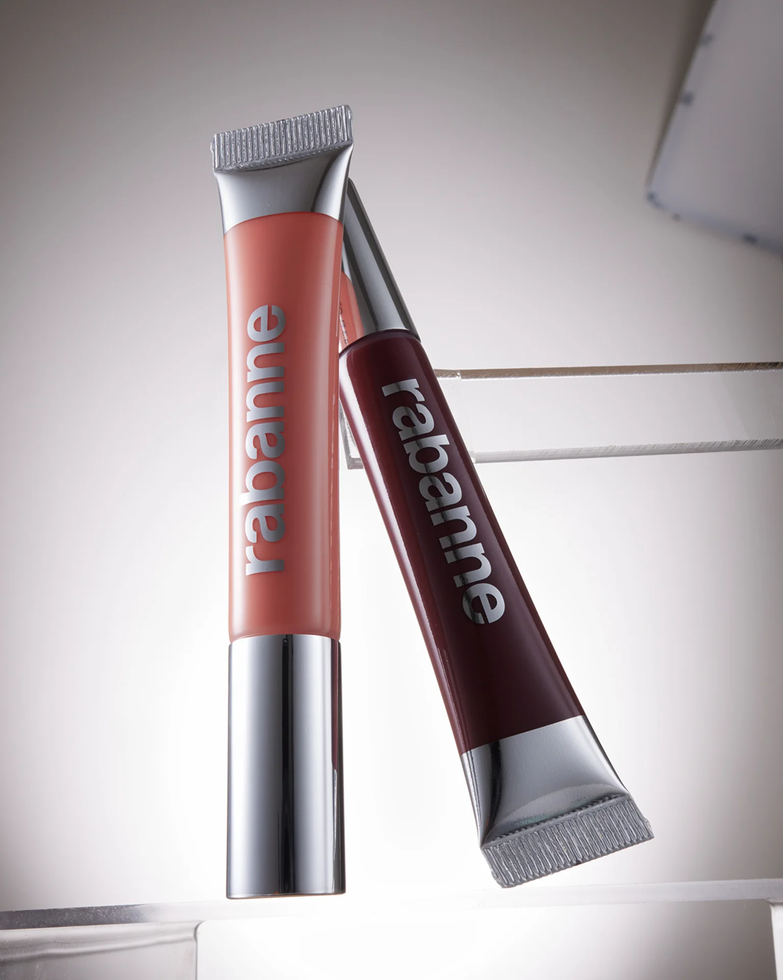 Original unretouched product photo of Rabanne lip gloss packaging before surface cleanup, highlight adjustments, and color correction, photography by kse.bolshakova
