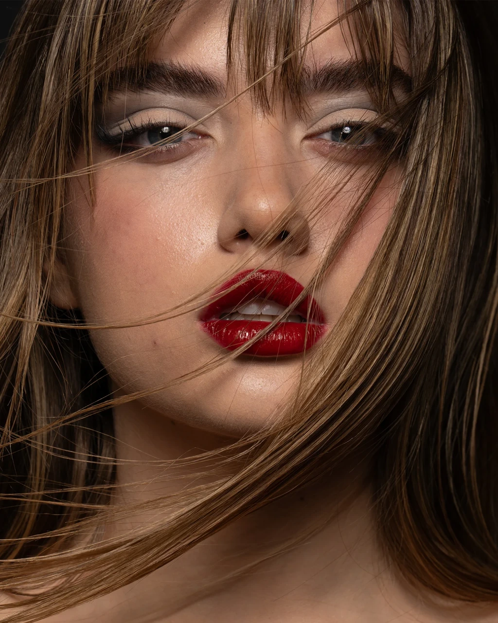 Original unretouched beauty portrait, showing natural skin details and makeup before color correction and refinement