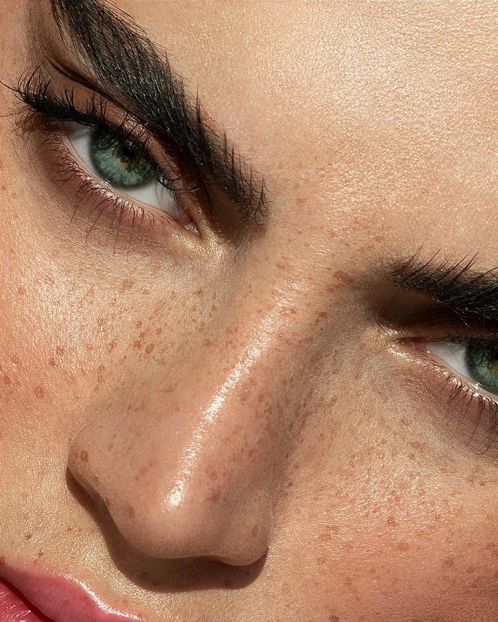 Close up beauty portrait with natural freckles and high-end skin texture retouching